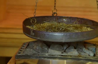 настои для пара в бане — травы и ковш рядом с каменкой